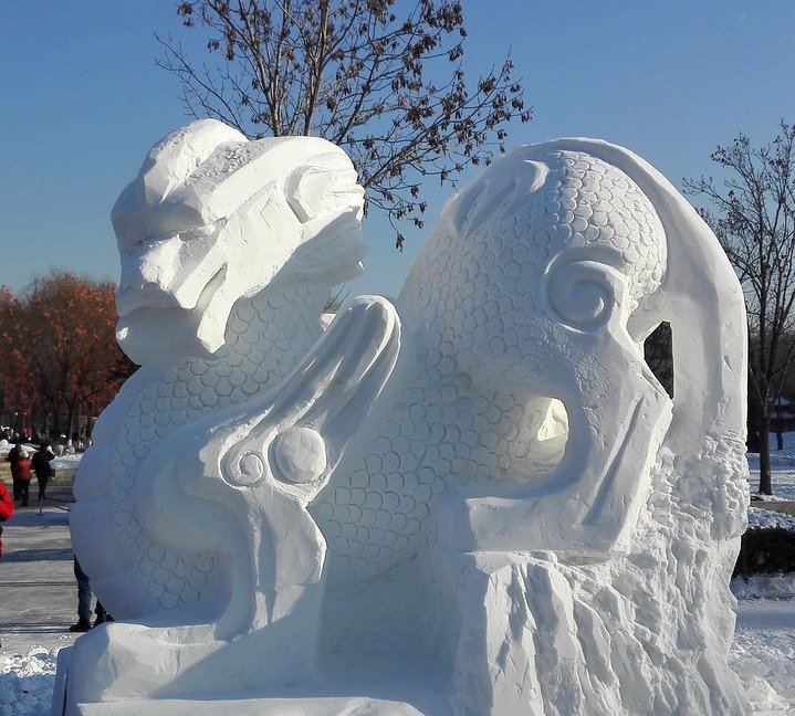 a snow sculpture of a dragon