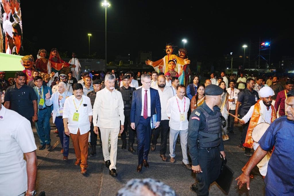 ALT Text: AP CM Chandrababu Naidu with foreign delegates visiting Avakai Amaravati Festival venue