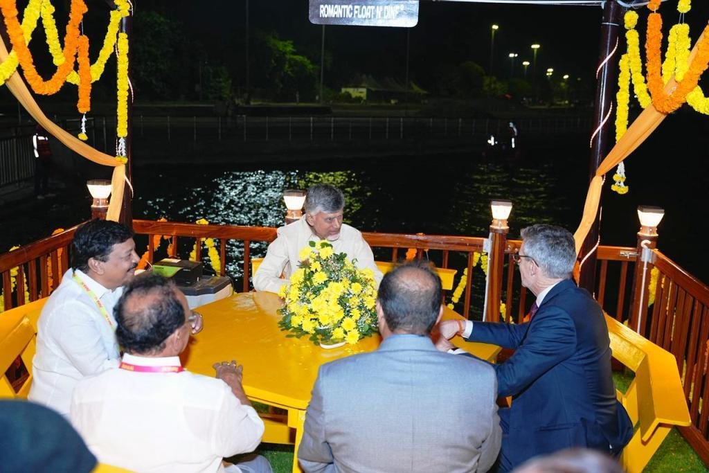 
AP CM Chandrababu Naidu participating in rituals on Krishna river bank during Avakai Festival
