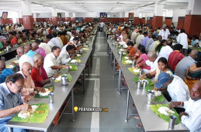 TTD volunteers serving free Annaprasadam to devotees at Tirumala